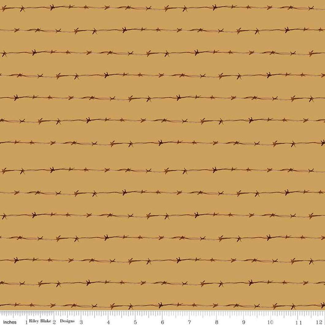 Ride the Range Fence Gold Cotton Fabric